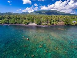 Dive into Lembeh at Hairball Resort - coast view.